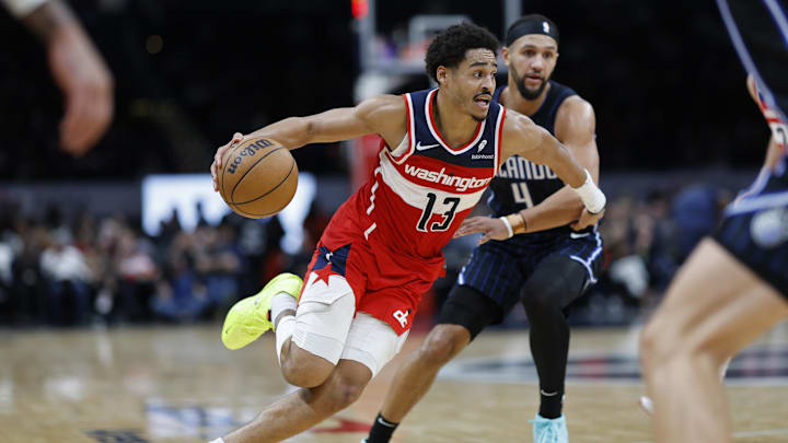 Mar 6, 2024; Washington, District of Columbia, USA; Washington Wizards guard Jordan Poole (13) drives to the basket past Orlando Magic guard Jalen Suggs (4) in the second half at Capital One Arena. Mandatory Credit: Geoff Burke-Imagn Images Mar 6, 2024; Washington, District of Columbia, USA; Washington Wizards guard Jordan Poole (13) drives to the basket past Orlando Magic guard Jalen Suggs (4) in the second half at Capital One Arena. Mandatory Credit: Geoff Burke-Imagn Images