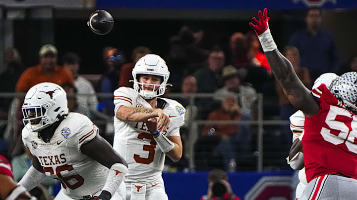 Texas Longhorns quarterback Quinn Ewers (3) throws a pass during the College Football Playoff semifinal game against Ohio State in the Cotton Bowl at AT&T Stadium on Friday, Jan. 10, 2024 in Arlington, Texas.