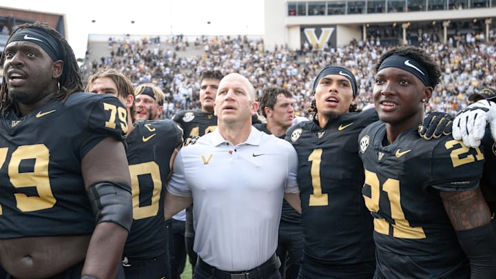 Oct 18, 2025; Nashville, Tennessee, USA; Vanderbilt Commodores head coach Clark Lea celebrates the win with his team and the student section against the Louisiana State Tigers during the second half at FirstBank Stadium. Mandatory Credit: Steve Roberts-Imagn Images Oct 18, 2025; Nashville, Tennessee, USA; Vanderbilt Commodores head coach Clark Lea celebrates the win with his team and the student section against the Louisiana State Tigers during the second half at FirstBank Stadium. Mandatory Credit: Steve Roberts-Imagn Images