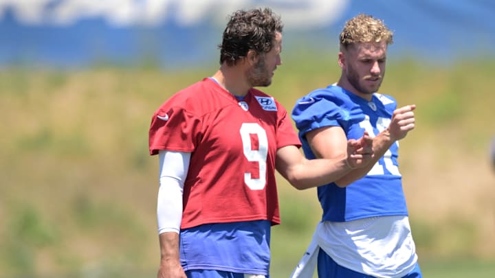 May 28, 2024; Thousand Oaks, CA, USA; Los Angeles Rams quarterback Matthew Stafford (9) and wide receiver Cooper Kupp (10) during OTAs at the team training facility at California Lutheran University. Mandatory Credit: Jayne Kamin-Oncea-Imagn Images