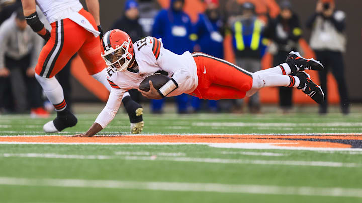 Jan 4, 2026; Cincinnati, Ohio, USA; Cleveland Browns quarterback Shedeur Sanders (12) rushes against the Cincinnati Bengals during the second half at Paycor Stadium. Mandatory Credit: Katie Stratman-Imagn Images