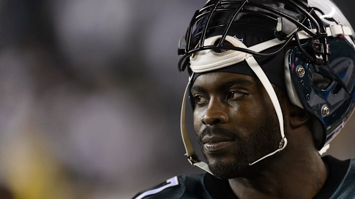 Dec 22, 2013; Philadelphia, PA, USA; Philadelphia Eagles quarterback Michael Vick (7) along the sidelines during the fourth quarter against the Chicago Bears at Lincoln Financial Field. The Eagles defeated the Bears 54-11. Mandatory Credit: Howard Smith-Imagn Images