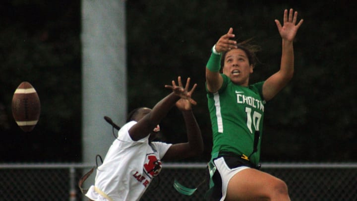 Choctawhatchee defender Kendal Wilson (10) deflects a pass intended for Miami Edison's Alexandria Harris (1) during a Florida High School Athletic Association Class 2A flag football semifinal at Mandarin High School in Jacksonville on May 13, 2022. [Clayton Freeman/Florida Times-Union]