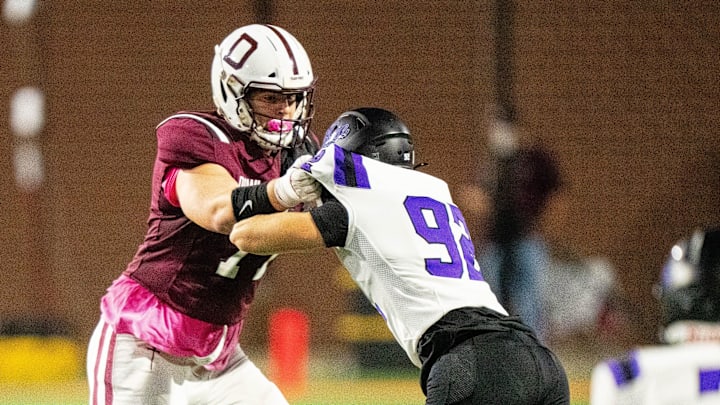 Dowling Catholic’s Carter Barrett (77) blocks during a game against Waukee on Oct. 10, 2025, at Valley Stadium in West Des Moines. Dowling Catholic’s Carter Barrett (77) blocks during a game against Waukee on Oct. 10, 2025, at Valley Stadium in West Des Moines.