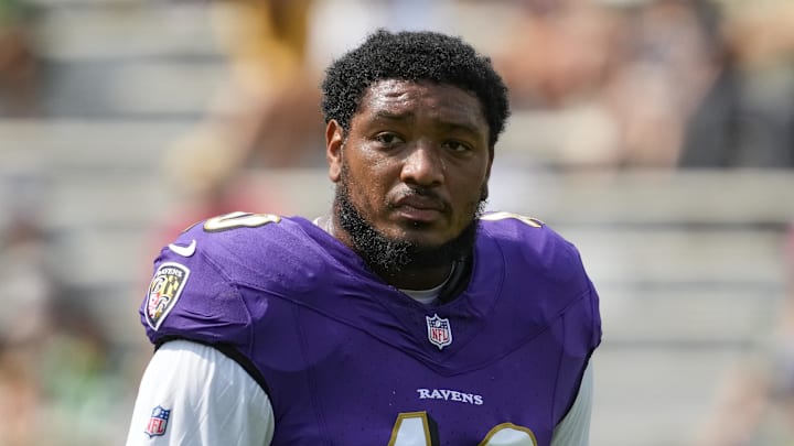 Aug 24, 2024; Green Bay, Wisconsin, USA;  Baltimore Ravens linebacker Malik Harrison (40) during warmups prior to the game against the Green Bay Packers at Lambeau Field. Mandatory Credit: Jeff Hanisch-Imagn Images