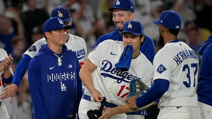 Sep 8, 2026; Los Angeles, California, USA; Los Angeles Dodgers starting pitcher Yoshinobu Yamamoto (18), designated hitter Shohei Ohtani (17) and pitcher Blake Snell (7) play around as they greet teammates after the final out of the ninth inning against the Cincinnati Reds at Dodger Stadium. Mandatory Credit: Jayne Kamin-Oncea-Imagn Images Sep 8, 2026; Los Angeles, California, USA; Los Angeles Dodgers starting pitcher Yoshinobu Yamamoto (18), designated hitter Shohei Ohtani (17) and pitcher Blake Snell (7) play around as they greet teammates after the final out of the ninth inning against the Cincinnati Reds at Dodger Stadium. Mandatory Credit: Jayne Kamin-Oncea-Imagn Images