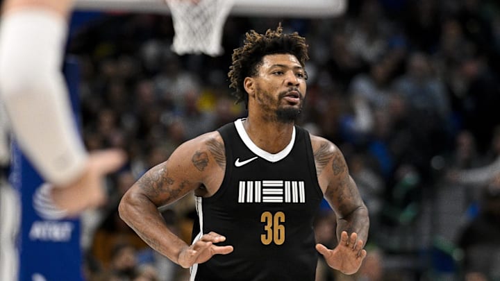 Jan 9, 2024; Dallas, Texas, USA; Memphis Grizzlies guard Marcus Smart (36) celebrates after he makes a three point shot against the Dallas Mavericks during the second half at the American Airlines Center. Mandatory Credit: Jerome Miron-USA TODAY Sports