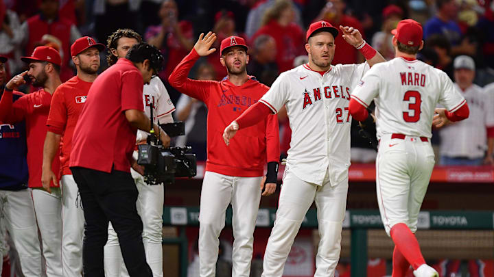 Sep 26, 2025; Anaheim, California, USA; Los Angeles Angels and designated hitter Mike Trout (27) celebrate the victory against the Houston Astros at Angel Stadium. Mandatory Credit: Gary A. Vasquez-Imagn Images Sep 26, 2025; Anaheim, California, USA; Los Angeles Angels and designated hitter Mike Trout (27) celebrate the victory against the Houston Astros at Angel Stadium. Mandatory Credit: Gary A. Vasquez-Imagn Images