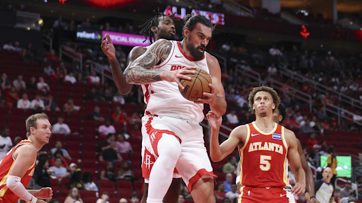 Oct 6, 2025; Houston, Texas, USA; Houston Rockets center Steven Adams (12) grabs a rebound during the third quarter against the Atlanta Hawks at Toyota Center. Mandatory Credit: Troy Taormina-Imagn Images Oct 6, 2025; Houston, Texas, USA; Houston Rockets center Steven Adams (12) grabs a rebound during the third quarter against the Atlanta Hawks at Toyota Center. Mandatory Credit: Troy Taormina-Imagn Images
