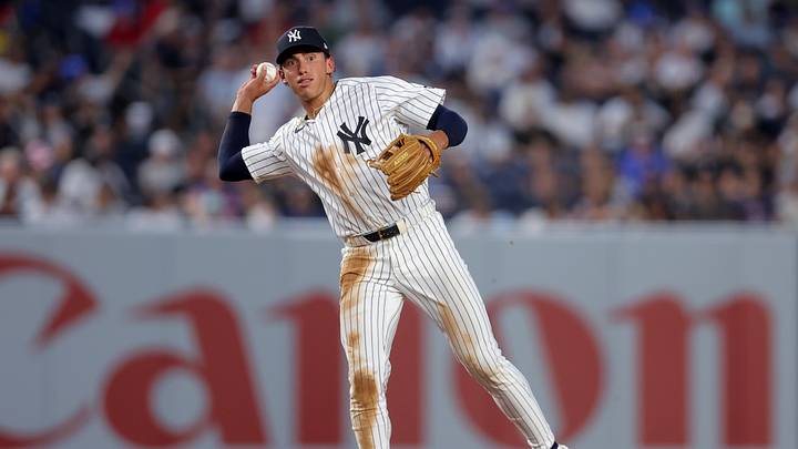 Aug 11, 2026; Bronx, New York, USA; New York Yankees shortstop George Lombard Jr. (96) throws out Seattle Mariners right fielder Taylor Ward (not pictured) on a ground ball during the third inning at Yankee Stadium. Mandatory Credit: Brad Penner-Imagn Images