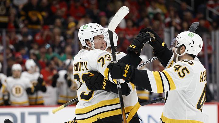 Mar 9, 2026; Washington, District of Columbia, USA; Boston Bruins defenseman Charlie McAvoy (73) celebrates with teammates after scoring a goal against the Washington Capitals during the second period at Capital One Arena. Mandatory Credit: Geoff Burke-Imagn Images