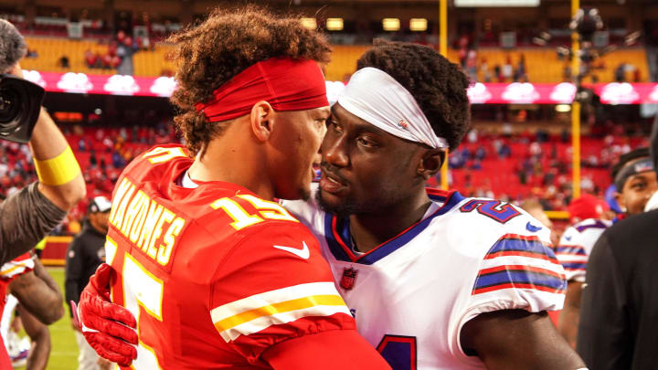 Oct 16, 2022; Kansas City, Missouri, USA; Kansas City Chiefs quarterback Patrick Mahomes (15) embraces Buffalo Bills cornerback Kaiir Elam (24) after the game at GEHA Field at Arrowhead Stadium. Mandatory Credit: Denny Medley-USA TODAY Sports