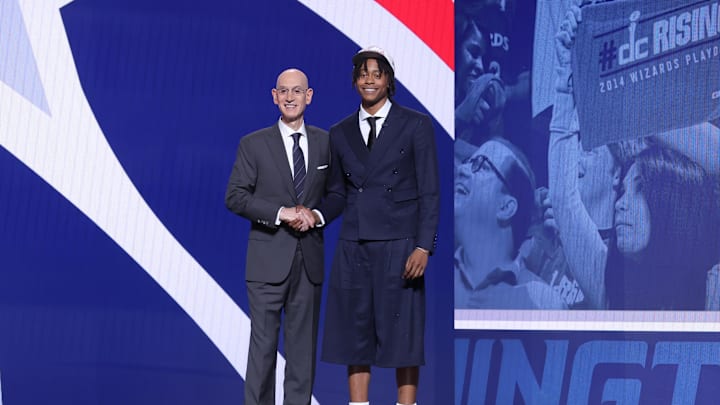 Jun 25, 2025; Brooklyn, NY, USA;  Tre Johnson stands with NBA commissioner Adam Silver after being selected as the sixth pick by the Washington Wizards in the first round of the 2025 NBA Draft at Barclays Center. Mandatory Credit: Brad Penner-Imagn Images