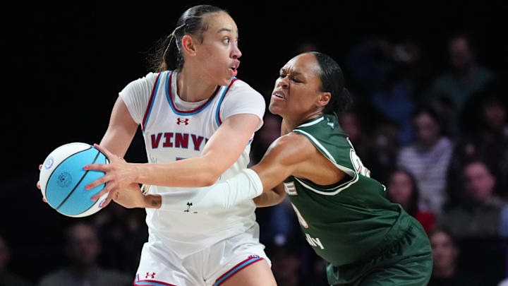 Jan 17, 2025; Miami, FL, USA; Dearica Hamby (5) of the Vinyl looks to pass the ball as Azura Stevens (23) of the Rose defends during the second half of the Unrivaled women’s professional 3v3 basketball league at Wayfair Arena. Mandatory Credit: Jim Rassol-Imagn Images