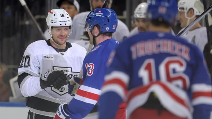 Mar 16, 2026; New York, New York, USA; Los Angeles Kings left wing Artemi Panarin (10) greets New York Rangers left wing Alexis Lafreniere (13) after a tribute video in Panarin's honor during a time out during the first period at Madison Square Garden. Mandatory Credit: Brad Penner-Imagn Images