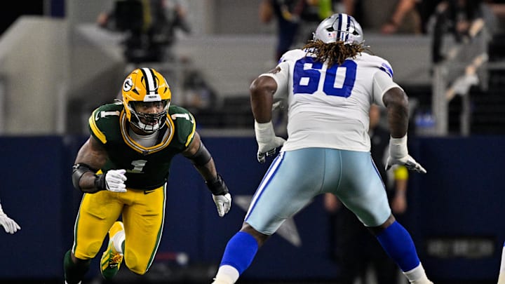Sep 28, 2025; Arlington, Texas, USA; Green Bay Packers defensive end Micah Parsons (1) rushes past the block of Dallas Cowboys offensive tackle Tyler Guyton (60) during the game between the Dallas Cowboys and the Green Bay Packers at AT&T Stadium. Mandatory Credit: Jerome Miron-Imagn Images