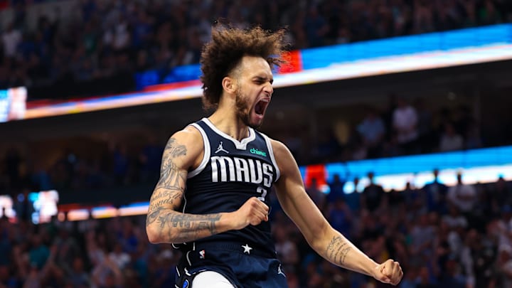 Apr 28, 2024; Dallas, Texas, USA; Dallas Mavericks center Dereck Lively II (2) reacts after dunking