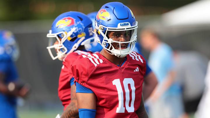 Kansas redshirt junior quarterback Chase Jenkins (10) makes a play during fall camp practice on Aug. 4, 2026. Kansas redshirt junior quarterback Chase Jenkins (10) makes a play during fall camp practice on Aug. 4, 2026.