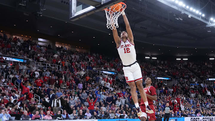  RJ Luis dunks against Arkansas in the NCAA Tournament. A 6-7 guard, he's the highest-ranked recruit available in the transfer portal according to On3 Sports.