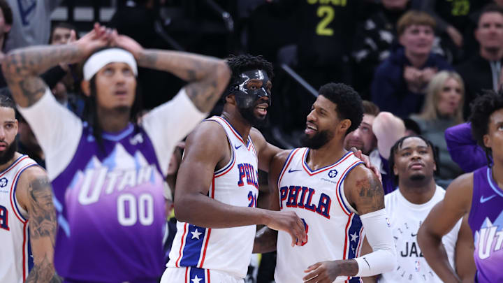 Dec 28, 2024; Salt Lake City, Utah, USA; Philadelphia 76ers center Joel Embiid (21) and forward Paul George (8) react to a play against the Utah Jazz during the fourth quarter at Delta Center. Mandatory Credit: Rob Gray-Imagn Images Dec 28, 2024; Salt Lake City, Utah, USA; Philadelphia 76ers center Joel Embiid (21) and forward Paul George (8) react to a play against the Utah Jazz during the fourth quarter at Delta Center. Mandatory Credit: Rob Gray-Imagn Images