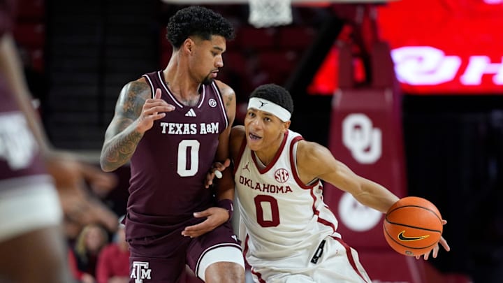 Oklahoma Sooners goes past Texas A&M Aggies guard Jace Carter (0) during an SEC men's college basketball game between the University of Oklahoma Sooners (OU) and the Texas A&M Aggies at Lloyd Noble Center in Norman, Okla., Wednesday, Jan. 8, 2025.