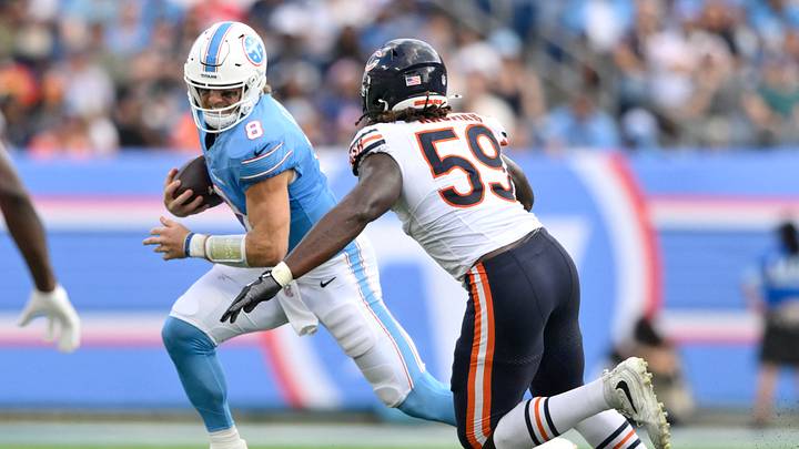 Aug 29, 2026; Nashville, Tennessee, USA;  Tennessee Titans quarterback Will Levis (8) runs against Chicago Bears defensive line Jamree Kromah (59) during the second quarter at Nissan Stadium.  Mandatory Credit: Steve Roberts-Imagn Images