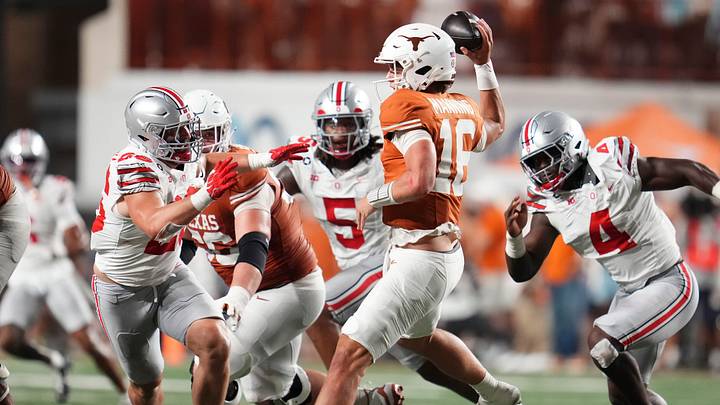 Texas quarterback Arch Manning (16) looks to throw over Ohio State linebacker Payton Pierce (26) in the Longhorns' 24-23 win Saturday. Texas quarterback Arch Manning (16) looks to throw over Ohio State linebacker Payton Pierce (26) in the Longhorns' 24-23 win Saturday.