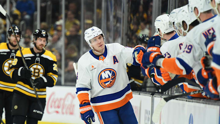 Jan 5, 2025; Boston, Massachusetts, USA; New York Islanders center Bo Horvat (14) is congratulated by his teammates after scoring a goal during the first period against the Boston Bruins at TD Garden. Mandatory Credit: Bob DeChiara-Imagn Images