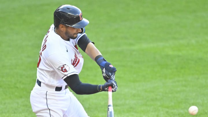 Cleveland Guardians right fielder Oscar Mercado (35) singles in the third inning against the Cincinnati Reds at Progressive Field in 2022.