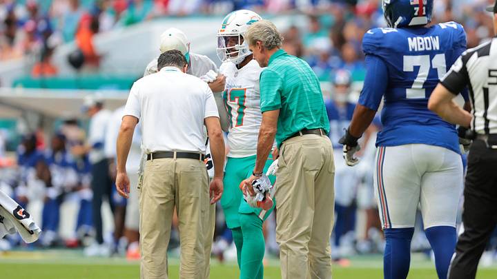 Miami Dolphins linebacker Trey Moore (17) exits the game after an apparent leg injury against the New York Giants during the first half during the first half at Hard Rock Stadium. Mandatory Credit: Sam Navarro-Imagn Images Miami Dolphins linebacker Trey Moore (17) exits the game after an apparent leg injury against the New York Giants during the first half during the first half at Hard Rock Stadium. Mandatory Credit: Sam Navarro-Imagn Images
