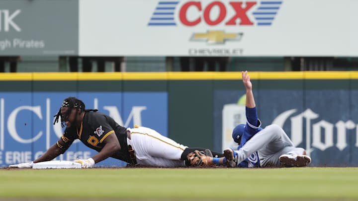 Mar 5, 2025; Bradenton, Florida, USA;  Pittsburgh Pirates outfield Oneil Cruz (15) steals second base as Toronto Blue Jays infielder Michael Stefanic (16) attempted to tag  him out at LECOM Park. Mandatory Credit: Kim Klement Neitzel-Imagn Images