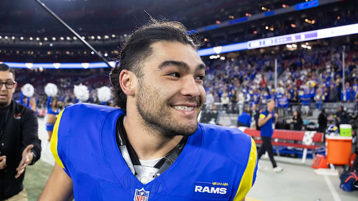 Jan 13, 2025; Glendale, AZ, USA; Los Angeles Rams wide receiver Puka Nacua (17) celebrates after defeating the Minnesota Vikings during an NFC wild card game at State Farm Stadium. Mandatory Credit: Mark J. Rebilas-Imagn Images