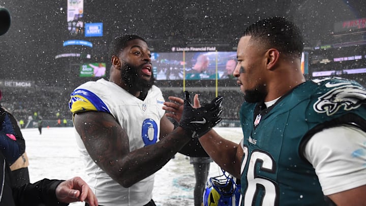 Jan 19, 2025; Philadelphia, Pennsylvania, USA; Los Angeles Rams linebacker Jared Verse (8) greets Philadelphia Eagles running back Saquon Barkley (26) after their 2025 NFC divisional round game at Lincoln Financial Field. Mandatory Credit: Eric Hartline-Imagn Images Jan 19, 2025; Philadelphia, Pennsylvania, USA; Los Angeles Rams linebacker Jared Verse (8) greets Philadelphia Eagles running back Saquon Barkley (26) after their 2025 NFC divisional round game at Lincoln Financial Field. Mandatory Credit: Eric Hartline-Imagn Images