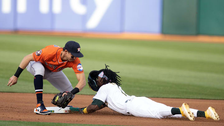 May 26, 2023; Oakland, California, USA; Oakland Athletics center fielder Esteury Ruiz (1) slides