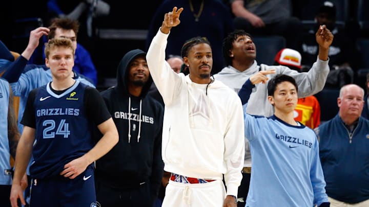 Nov 20, 2024; Memphis, Tennessee, USA; Memphis Grizzlies guard Cam Spencer (24), guard Marcus Smart (36), guard Ja Morant (12), forward GG Jackson II (45) and guard Yuki Kawamura (17) react from the bench during the second half against the Philadelphia 76ers at FedExForum. Mandatory Credit: Petre Thomas-Imagn Images Nov 20, 2024; Memphis, Tennessee, USA; Memphis Grizzlies guard Cam Spencer (24), guard Marcus Smart (36), guard Ja Morant (12), forward GG Jackson II (45) and guard Yuki Kawamura (17) react from the bench during the second half against the Philadelphia 76ers at FedExForum. Mandatory Credit: Petre Thomas-Imagn Images