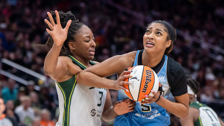 Aug 27, 2025; Seattle, Washington, USA; Chicago Sky forward Angel Reese (5) goes up for a shot against Seattle Storm forward Nneka Ogwumike (3) during the second half at T-Mobile Park. Mandatory Credit: Stephen Brashear-Imagn Images