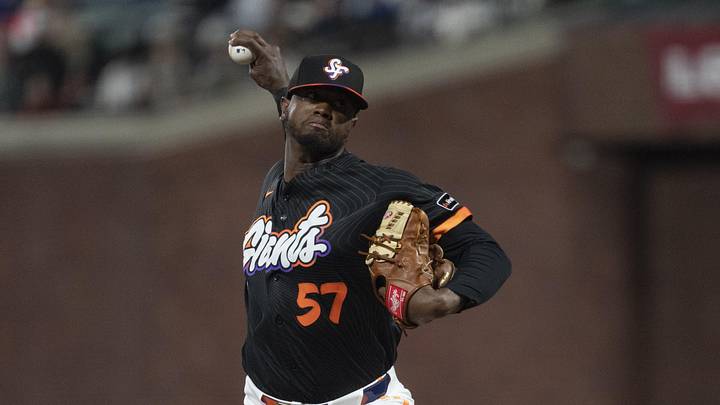 May 5, 2026; San Francisco, California, USA; San Francisco Giants pitcher Gregory Santos (57) pitches during the seventh inning against the San Diego Padres at Oracle Park. Mandatory Credit: Stan Szeto-Imagn Images
