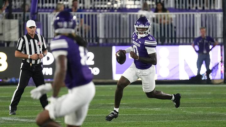 Sep 5, 2026; Evanston, Illinois, USA; Northwestern Wildcats quarterback Aidan Chiles (0) scrambles against the South Dakota State Jackrabbits during the first half at Northwestern Medicine Field at Martin Stadium. Mandatory Credit: David Banks-Imagn Images Sep 5, 2026; Evanston, Illinois, USA; Northwestern Wildcats quarterback Aidan Chiles (0) scrambles against the South Dakota State Jackrabbits during the first half at Northwestern Medicine Field at Martin Stadium. Mandatory Credit: David Banks-Imagn Images