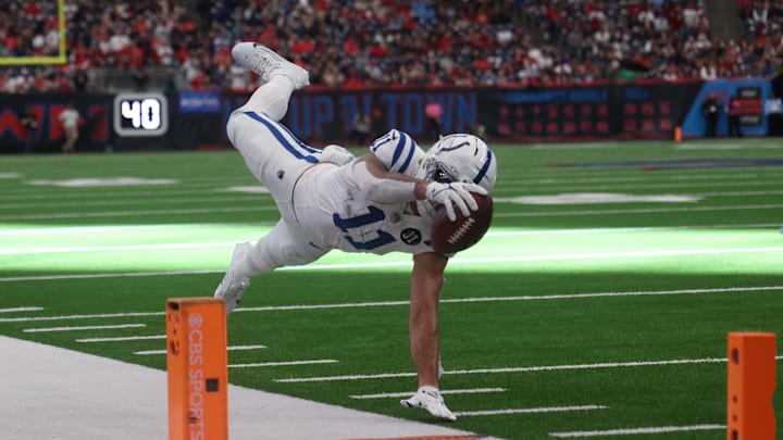 Jan 4, 2026; Houston, Texas, USA; Indianapolis Colts wide receiver Michael Pittman Jr. (11) makes the catch and dives short of the end zone Houston Texans during the second half at NRG Stadium. Mandatory Credit: Thomas Shea-Imagn Images Jan 4, 2026; Houston, Texas, USA; Indianapolis Colts wide receiver Michael Pittman Jr. (11) makes the catch and dives short of the end zone Houston Texans during the second half at NRG Stadium. Mandatory Credit: Thomas Shea-Imagn Images