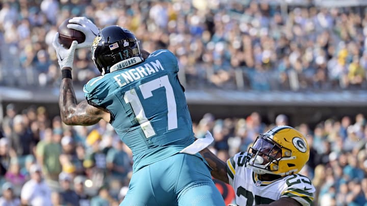 Oct 27, 2024; Jacksonville, Florida, USA; Jacksonville Jaguars tight end Evan Engram (17) catches a touchdown pass during the fourth quarter against the Green Bay Packers at EverBank Stadium. Mandatory Credit: Melina Myers-Imagn Images