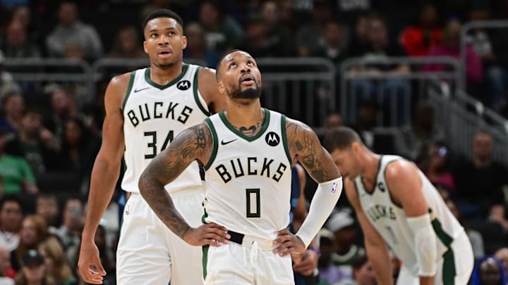 Oct 20, 2023; Milwaukee, Wisconsin, USA; Milwaukee Bucks guard Damian Lillard (0) and forward Giannis Antetokounmpo (34) looks on in the second quarter against the Memphis Grizzlies at Fiserv Forum. Mandatory Credit: Benny Sieu-Imagn Images Oct 20, 2023; Milwaukee, Wisconsin, USA; Milwaukee Bucks guard Damian Lillard (0) and forward Giannis Antetokounmpo (34) looks on in the second quarter against the Memphis Grizzlies at Fiserv Forum. Mandatory Credit: Benny Sieu-Imagn Images