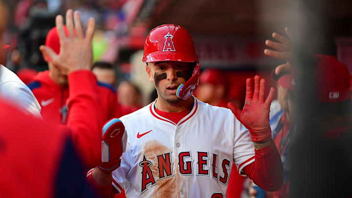 Apr 18, 2025; Anaheim, California, USA; Los Angeles Angels shortstop Zach Neto (9) is greeted after scoring a run against the San Francisco Giants during the second inning at Angel Stadium. Mandatory Credit: Gary A. Vasquez-Imagn Images Apr 18, 2025; Anaheim, California, USA; Los Angeles Angels shortstop Zach Neto (9) is greeted after scoring a run against the San Francisco Giants during the second inning at Angel Stadium. Mandatory Credit: Gary A. Vasquez-Imagn Images