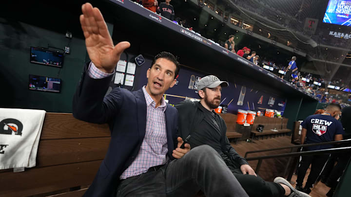 Arizona Diamondbacks general manager Mike Hazen talks from the dugout before the team plays the Texas Rangers during Game 2 of the World Series at Globe Life Field on Oct. 28, 2023, in Arlington, Texas.