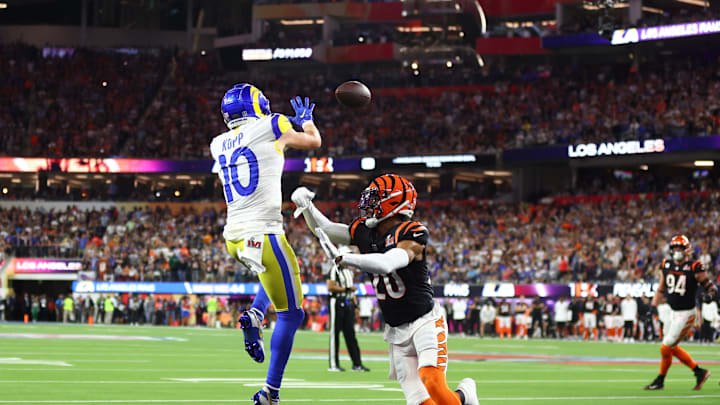 Feb 13, 2022; Inglewood, CA, USA; Los Angeles Rams wide receiver Cooper Kupp (10) catches a touchdown pass against Cincinnati Bengals cornerback Eli Apple (20) in the fourth quarter of Super Bowl LVI at SoFi Stadium. Mandatory Credit: Mark J. Rebilas-Imagn Images