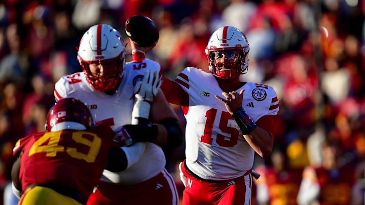 Nov 16, 2024; Los Angeles, California, USA; Nebraska Cornhuskers quarterback Dylan Raiola throws as offensive lineman Bryce Benhart blocks against the Southern California Trojans. Nov 16, 2024; Los Angeles, California, USA; Nebraska Cornhuskers quarterback Dylan Raiola throws as offensive lineman Bryce Benhart blocks against the Southern California Trojans.