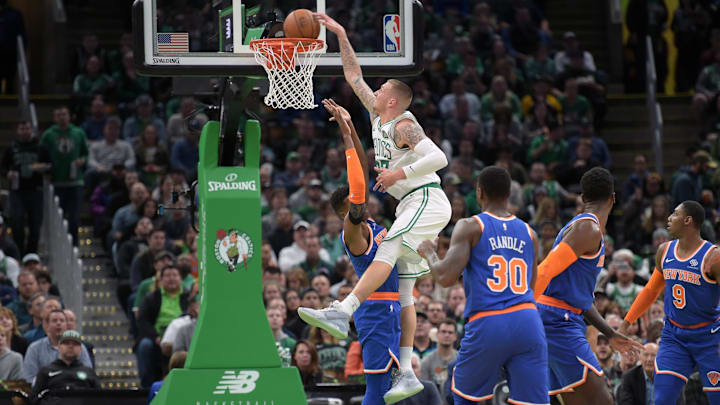 Nov 1, 2019; Boston, MA, USA; Boston Celtics forward Daniel Theis (27) dunks the ball while New York Knicks center Julius Randle (30) looks on during the first half at TD Garden. Mandatory Credit: Bob DeChiara-Imagn Images
