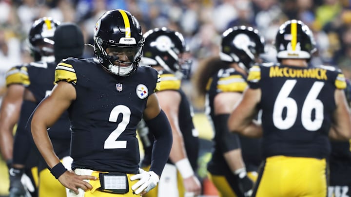 Oct 6, 2024; Pittsburgh, Pennsylvania, USA;  Pittsburgh Steelers quarterback Justin Fields (2) looks to the sidelines against the Dallas Cowboys during the first quarter at Acrisure Stadium. Mandatory Credit: Charles LeClaire-Imagn Images