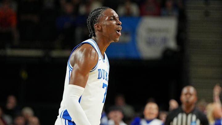 Mar 21, 2026; Greenville, SC, USA; Duke Blue Devils guard Dame Sarr (7) reacts after a play during the second half against the Texas Christian University Horned Frogs during a second round game of the men's 2026 NCAA Tournament at Bon Secours Wellness Arena.