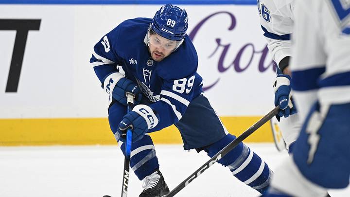 Mar 7, 2026; Toronto, Ontario, CAN;  Toronto Maple Leafs forward Nick Robertson (89) gathers a loose puck in the first period against the Tampa Bay Lightning at Scotiabank Arena. Mandatory Credit: Dan Hamilton-Imagn Images