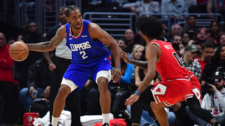  Los Angeles Clippers forward Kawhi Leonard (2) moves the ball against Chicago Bulls guard Coby White (0) during the first half at Crypto.com Arena. Mandatory Credit: Gary A. Vasquez-Imagn Images